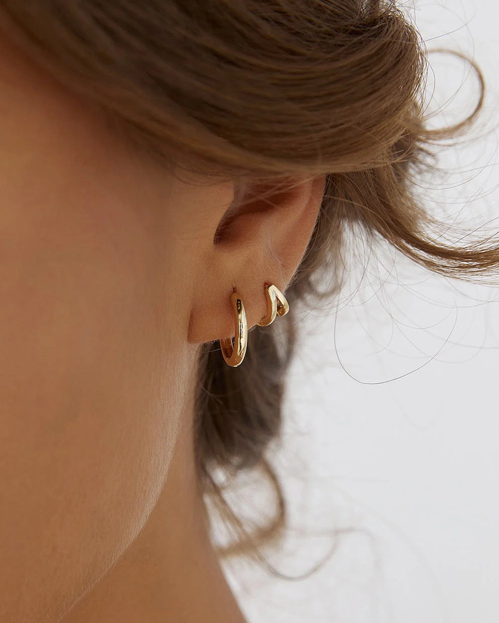 Jean Gold Huggie Earrings by Arms of Eve